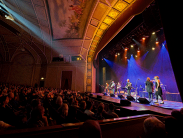 A crowd watches a performances at the Sanderson Centre